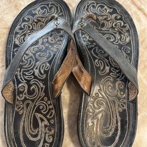 OluKai Black and Brown Sandals